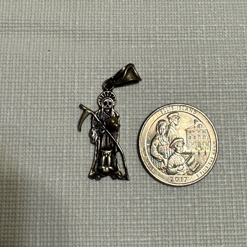 Santa Muerte Silver Pendant